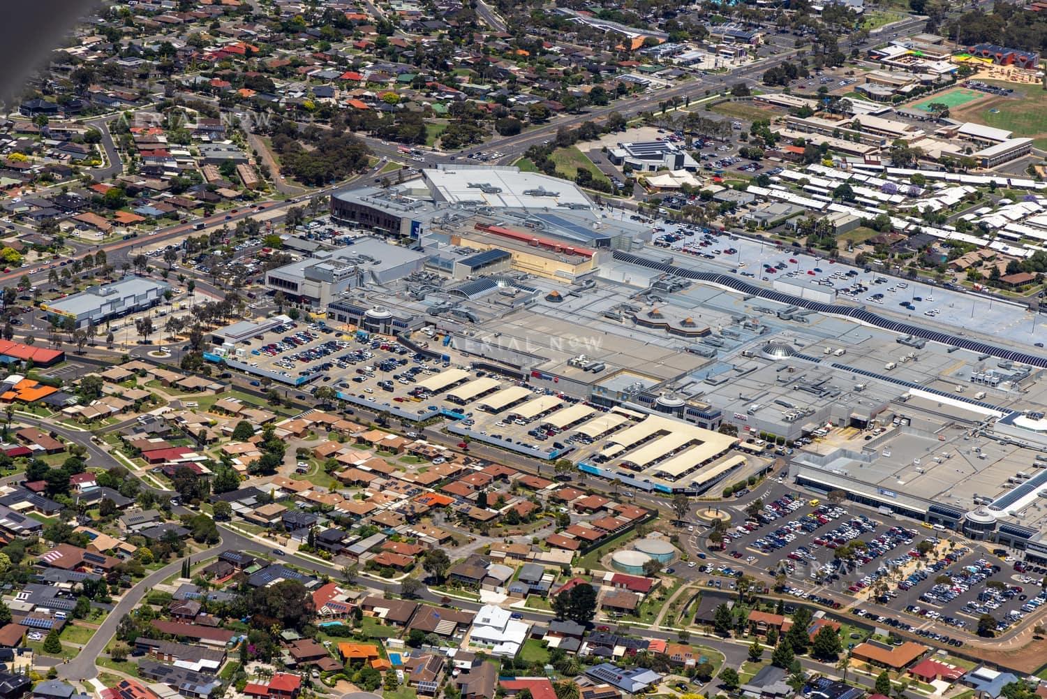 Aerial view of Pacific Werribee shopping centre in Werribee, VIC, showing the large retail complex, car parks, surrounding roads and nearby residential streets.