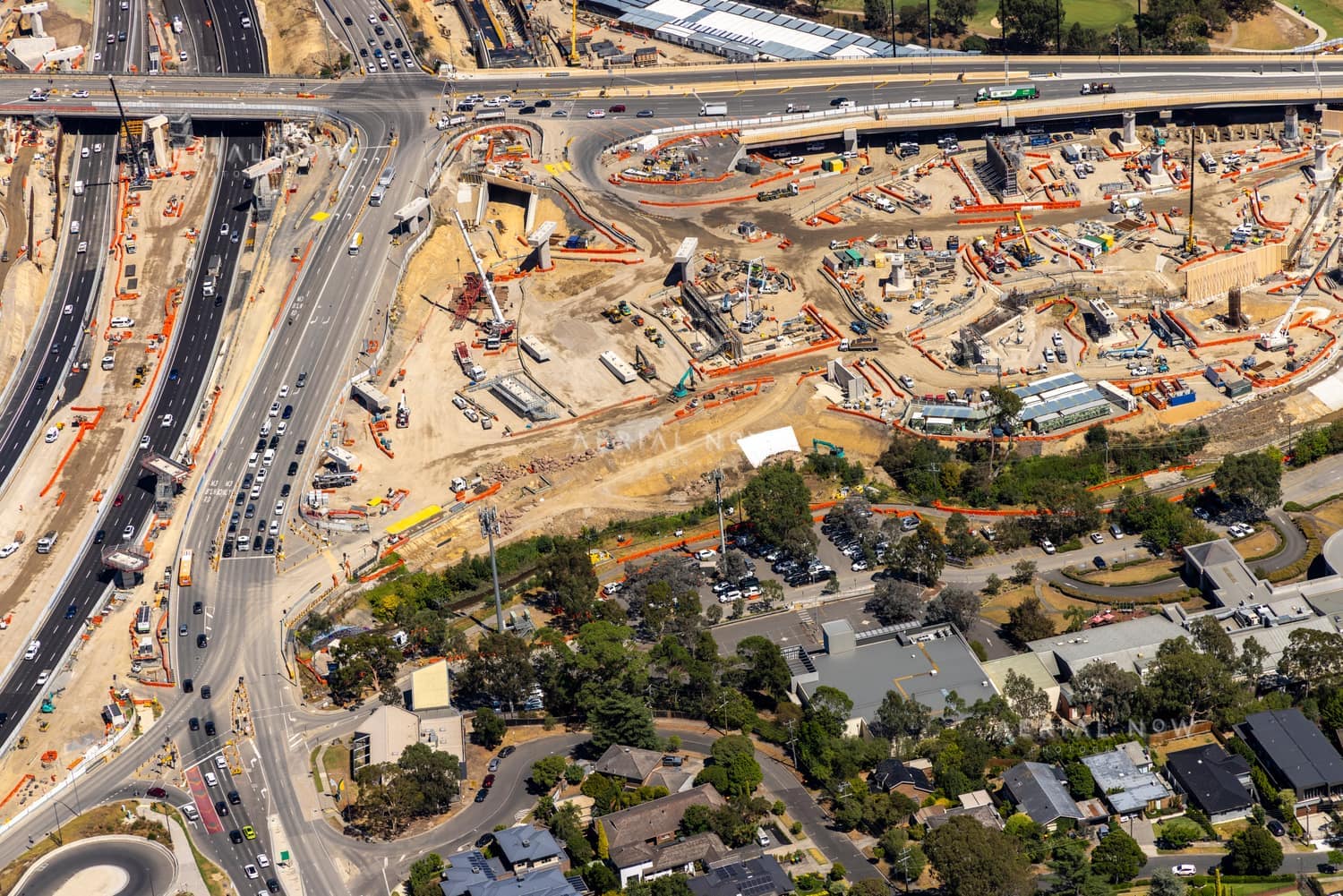 North East Link construction with road traffic and cranes, Bulleen VIC ...