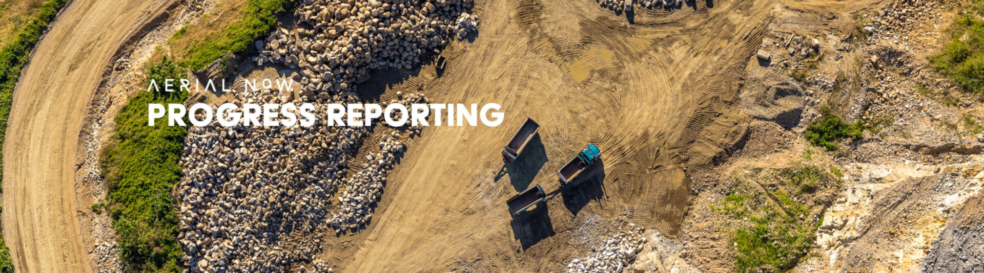 Aerial view of a residential construction site with materials and earthworks, progress reporting Melbourne