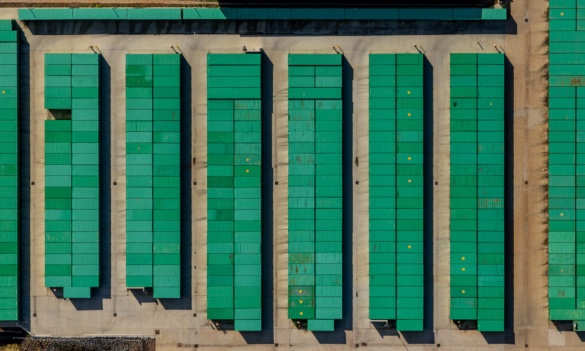 High-resolution top-down aerial photograph of an industrial facility and container assets. Systematized visual recording for asset documentation and site condition reporting.