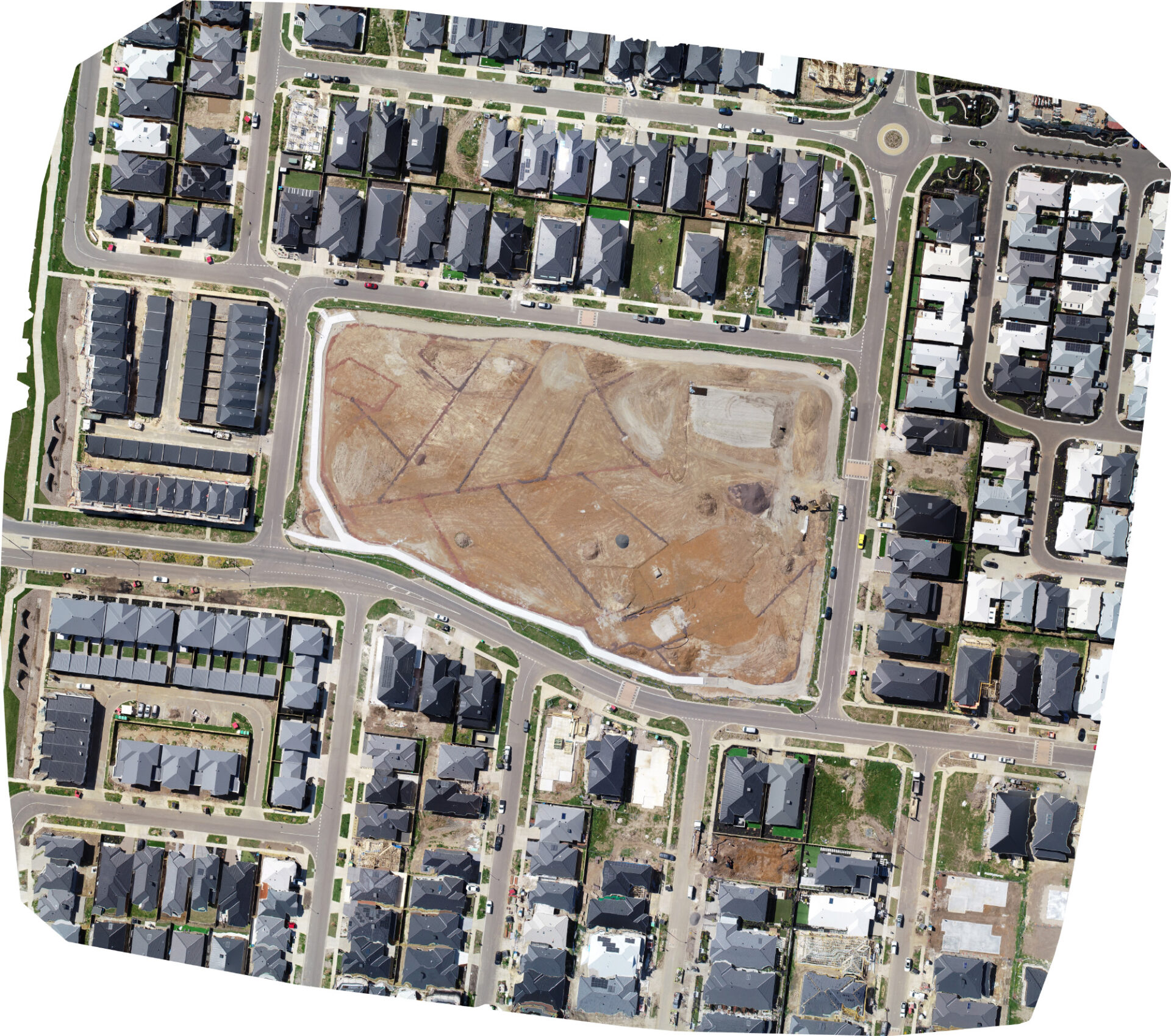 Aerial drone photo of a Melbourne residential land development showing construction milestones and earthworks progress