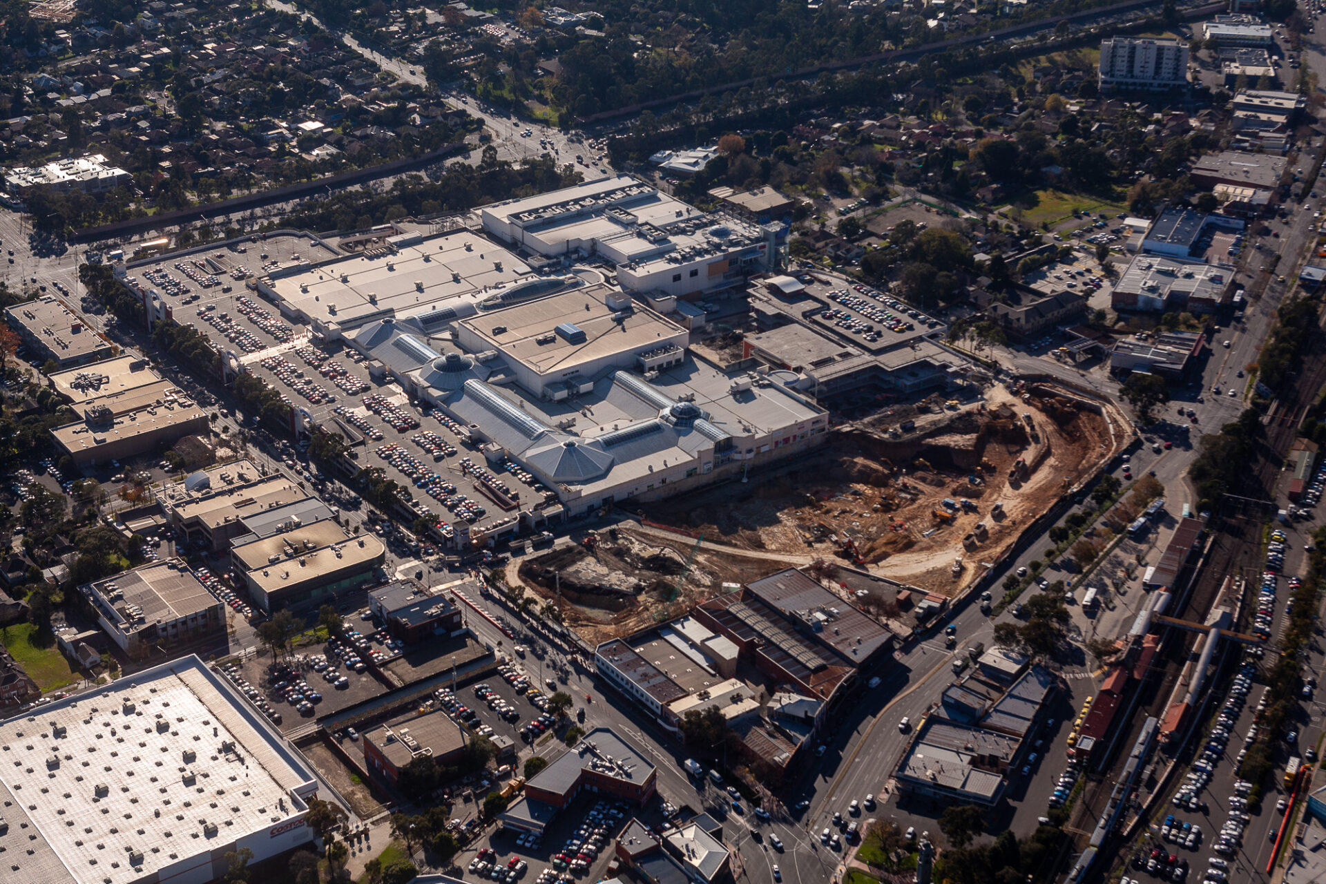 Mid-construction aerial overview of Eastland Shopping Centre redevelopment Melbourne